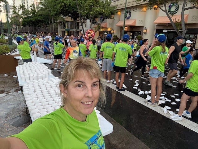 Gotanda volunteering at Honolulu marathon